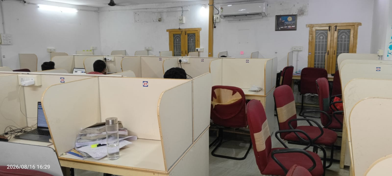 Students at individual study cabins in the Amigos Reading Hall, Labbipet, Vijayawada