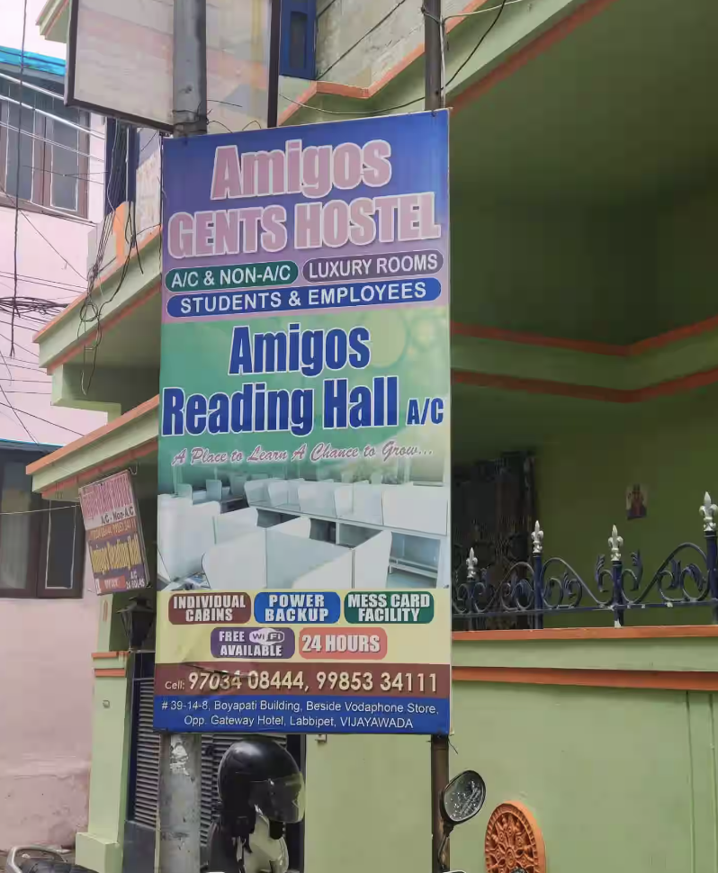Amigos Gents Hostel and Reading Hall signboard at the entrance, Labbipet, Vijayawada